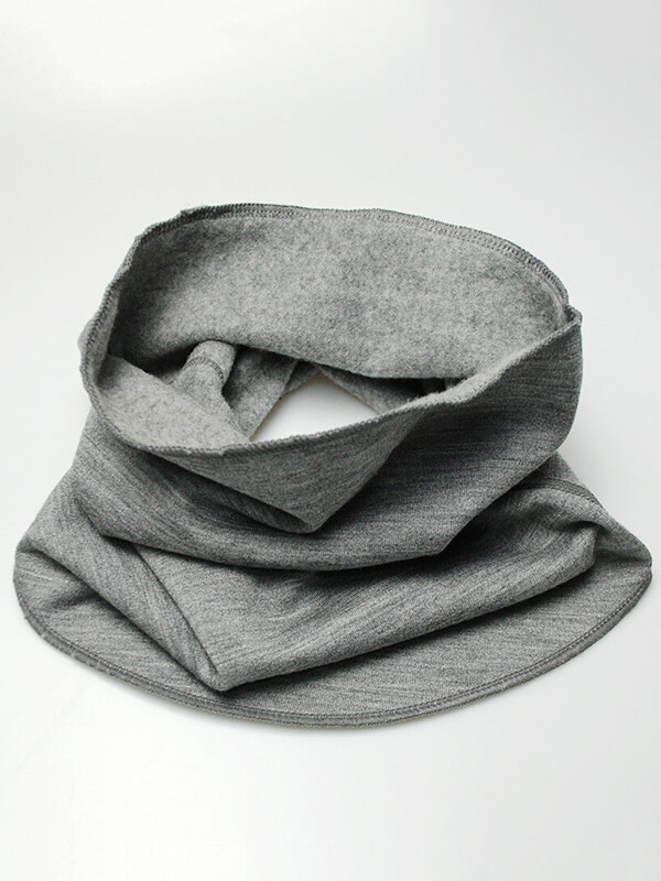 Merino wool thermal neck gaiter for men and women, featuring a soft geometric design, perfect for winter warmth and style.